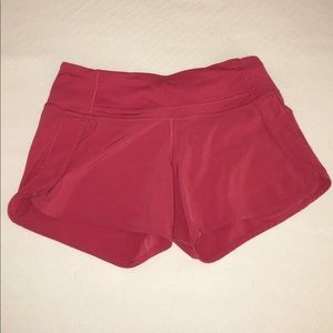 Pink lululemon shorts.